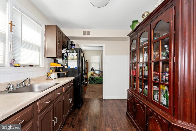 kitchen featuring dark hardwood / wood-style floors and sink