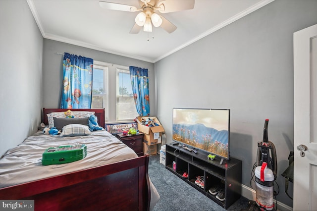 bedroom with ceiling fan, carpet floors, and ornamental molding