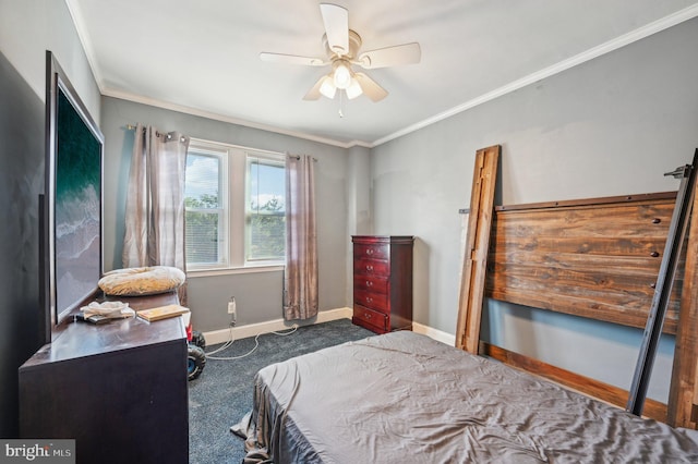 carpeted bedroom with crown molding and ceiling fan