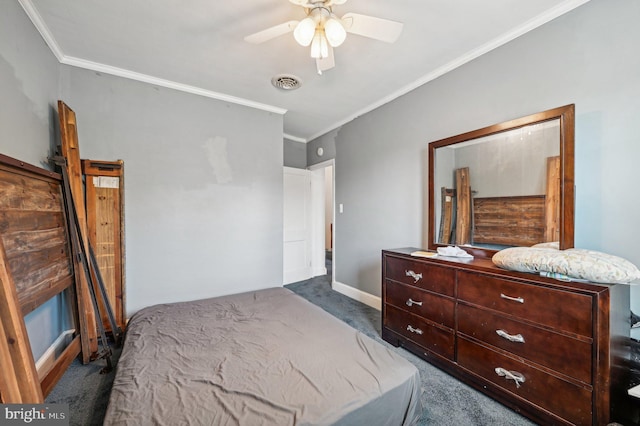 bedroom featuring dark colored carpet, ceiling fan, and crown molding