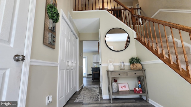 interior space with dark hardwood / wood-style flooring