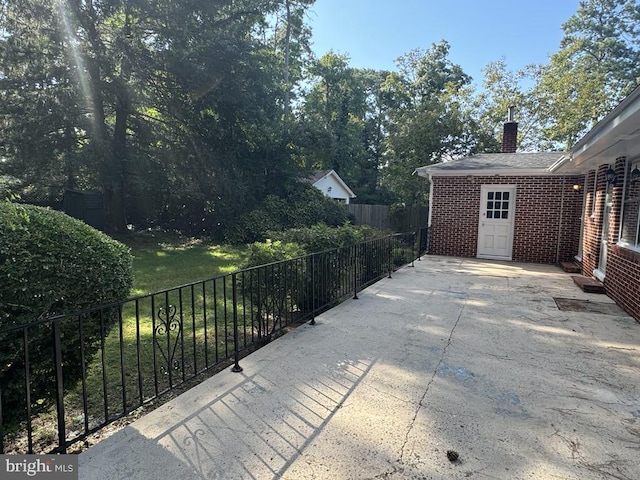 view of patio / terrace with fence