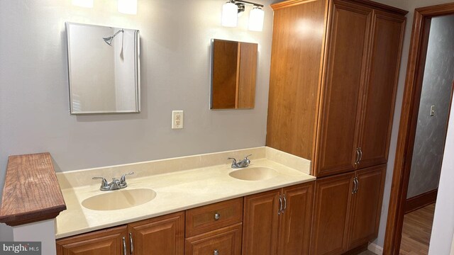 laundry area with baseboard heating, light tile patterned floors, and separate washer and dryer