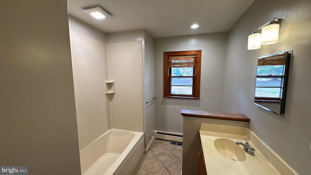 bathroom with baseboard heating, vanity, a bathtub, and tile patterned flooring