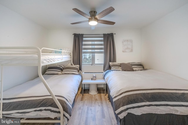 bedroom featuring ceiling fan and light wood-type flooring