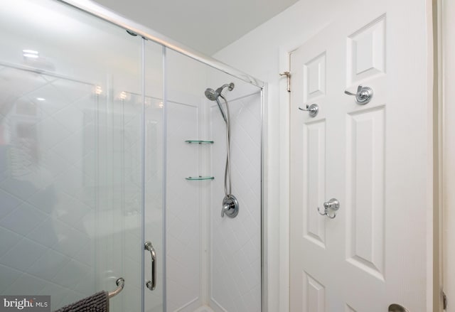 bathroom featuring an enclosed shower