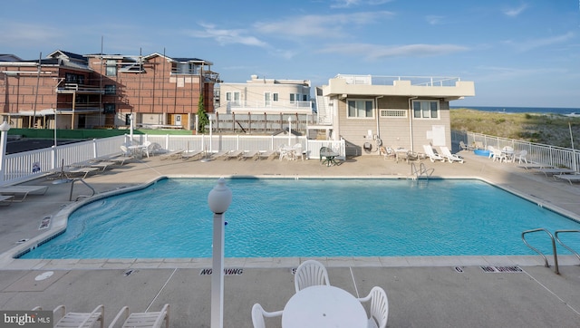 view of swimming pool featuring a patio