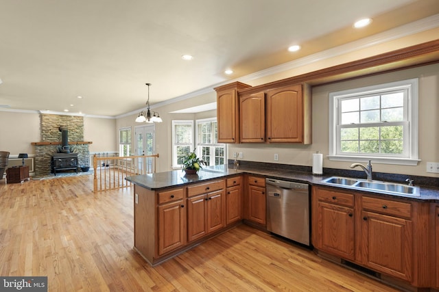 1159 Stoney Bottom Rd, Front Royal, VA 22630 - kitchen with dishwasher, brown cabinetry, ornamental molding, open floor plan, and light wood finished floors