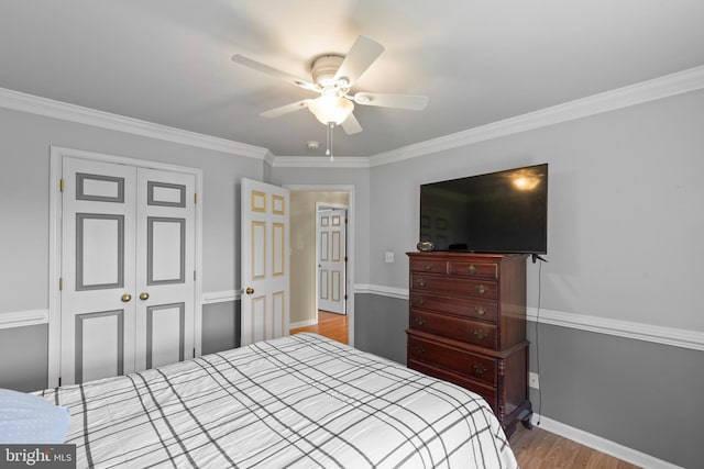1159 Stoney Bottom Rd, Front Royal, VA 22630 - bedroom featuring wood finished floors, a closet, ornamental molding, and ceiling fan