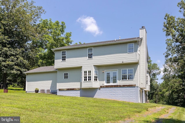 1159 Stoney Bottom Rd, Front Royal, VA 22630 - back of property featuring french doors, a lawn, and a chimney