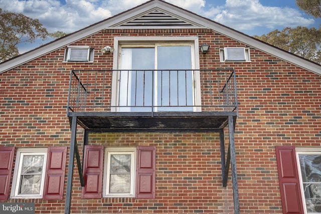 view of property exterior with a balcony