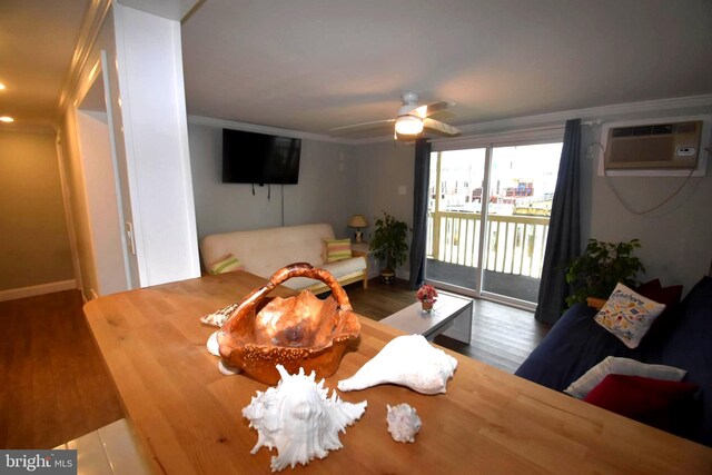 dining space featuring hardwood / wood-style floors, ceiling fan, crown molding, and an AC wall unit