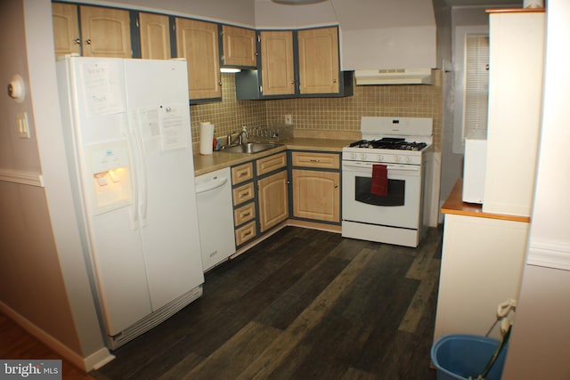 kitchen featuring sink, dark hardwood / wood-style flooring, white appliances, and decorative backsplash