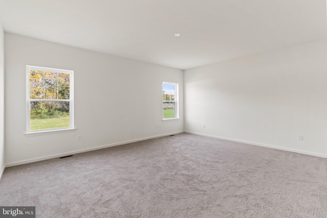 spare room with carpet flooring