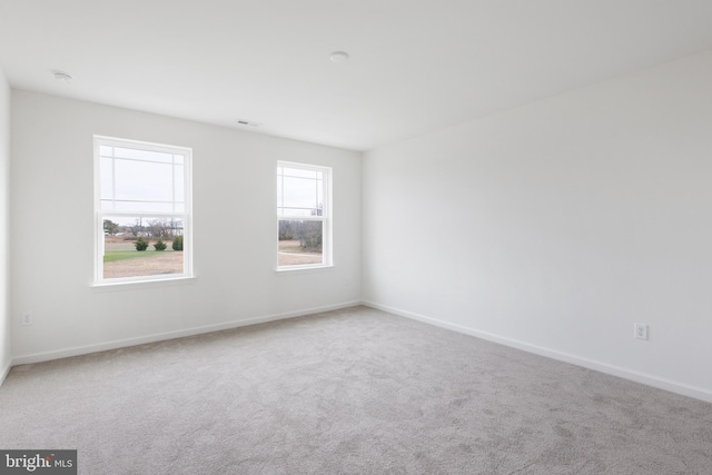 view of carpeted spare room