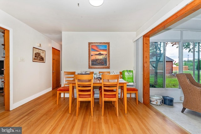 dining room with light hardwood / wood-style floors