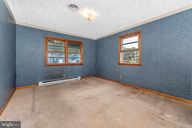 spare room with crown molding, a baseboard heating unit, and a textured ceiling