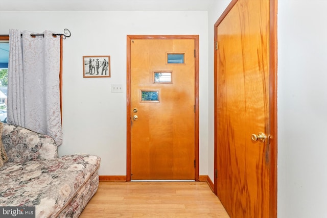 doorway featuring light hardwood / wood-style flooring