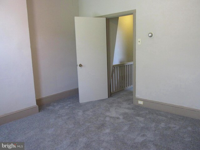 empty room featuring carpet floors