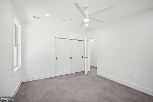 unfurnished bedroom with recessed lighting, a closet, visible vents, and baseboards