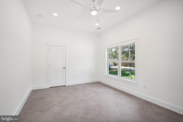 unfurnished room with ceiling fan