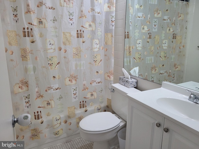 full bath with tile patterned flooring, shower / bath combination with curtain, toilet, and vanity