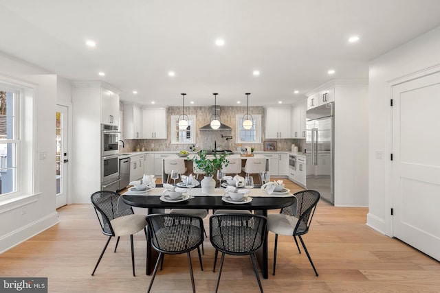 dining room featuring light hardwood / wood-style flooring