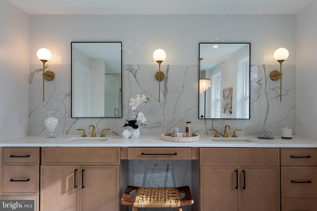 bathroom featuring backsplash, vanity, and tile walls