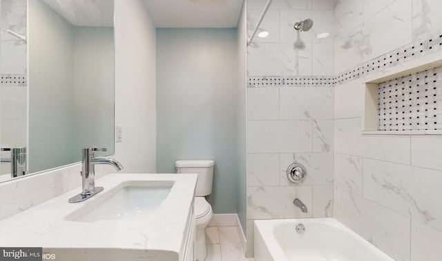 full bathroom featuring vanity, toilet, and tiled shower / bath