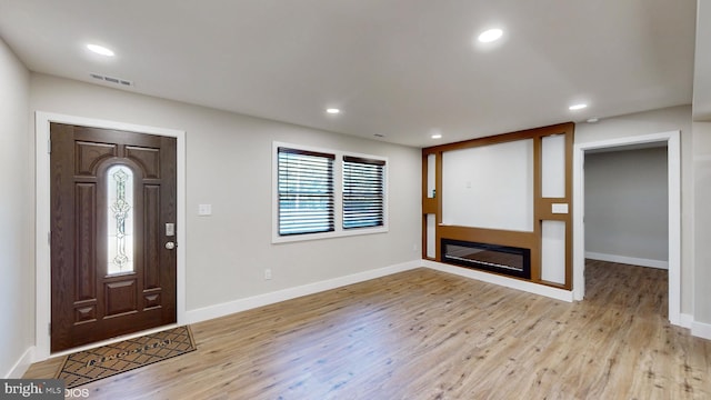 entrance foyer with light hardwood / wood-style floors