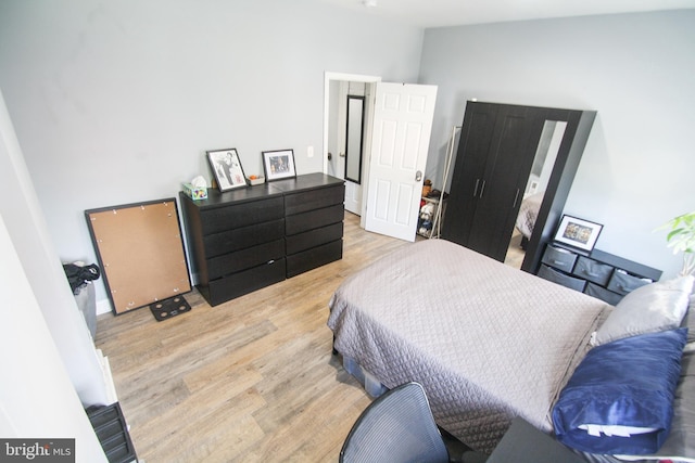 bedroom with light hardwood / wood-style floors