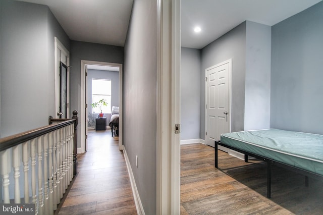 hallway featuring hardwood / wood-style floors