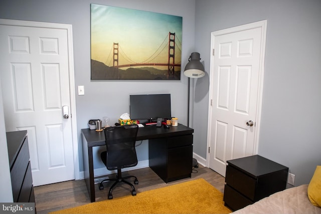 office space with hardwood / wood-style floors