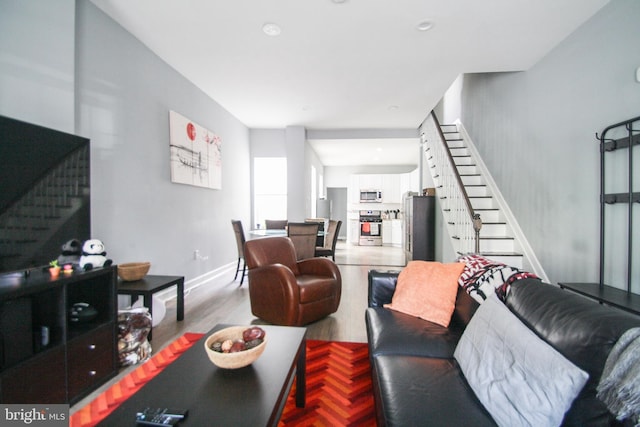 living room featuring light parquet floors