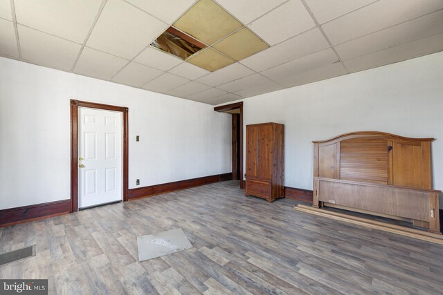 additional living space with wood-type flooring