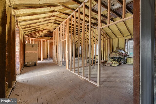 miscellaneous room with lofted ceiling