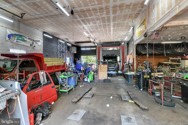 garage with a workshop area