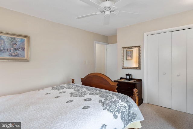 bedroom featuring carpet floors, ceiling fan, and a closet