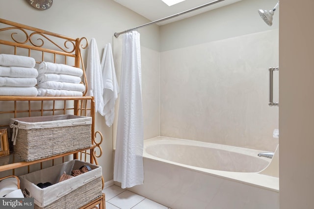 bathroom with shower / tub combo and tile patterned floors