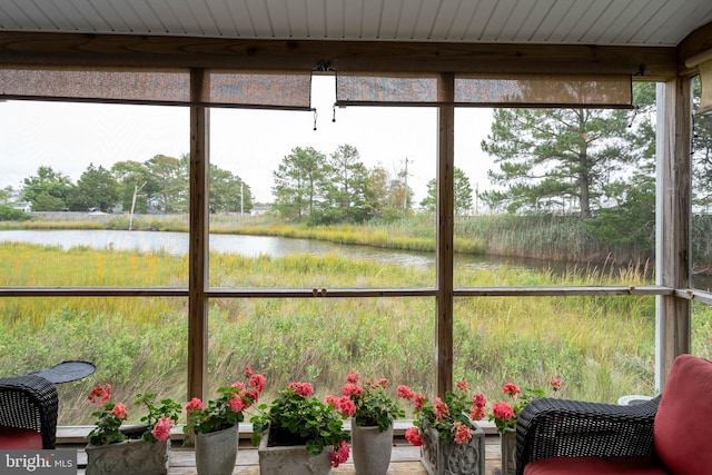 sunroom with a water view