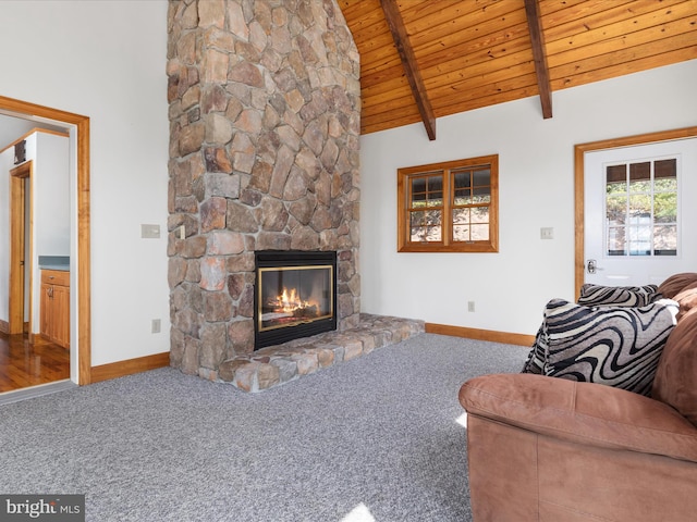 carpeted living room with wood ceiling, beam ceiling, high vaulted ceiling, and a stone fireplace