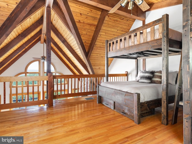 unfurnished bedroom with wooden ceiling, light hardwood / wood-style floors, beamed ceiling, and high vaulted ceiling