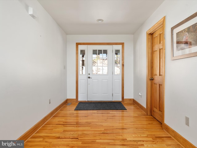 doorway featuring light hardwood / wood-style flooring