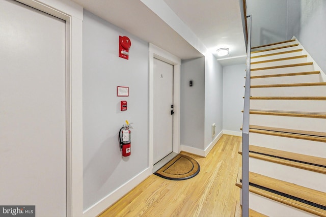 interior space with hardwood / wood-style flooring