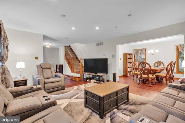 8 Annapolis Dr, Sicklerville, NJ 08081 - living room with a notable chandelier, recessed lighting, visible vents, light wood-style flooring, and stairway