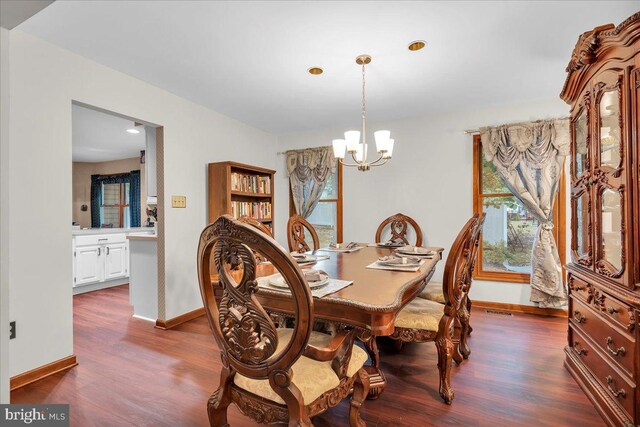 8 Annapolis Dr, Sicklerville, NJ 08081 - dining space featuring an inviting chandelier, visible vents, baseboards, and dark wood-type flooring