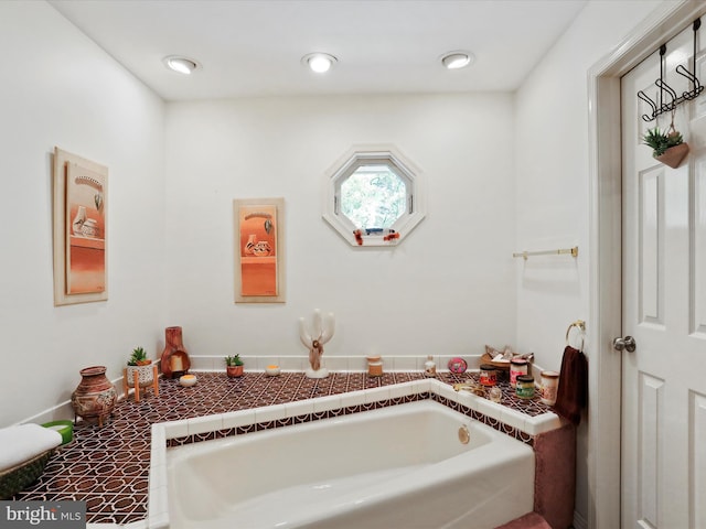 bathroom featuring a bath