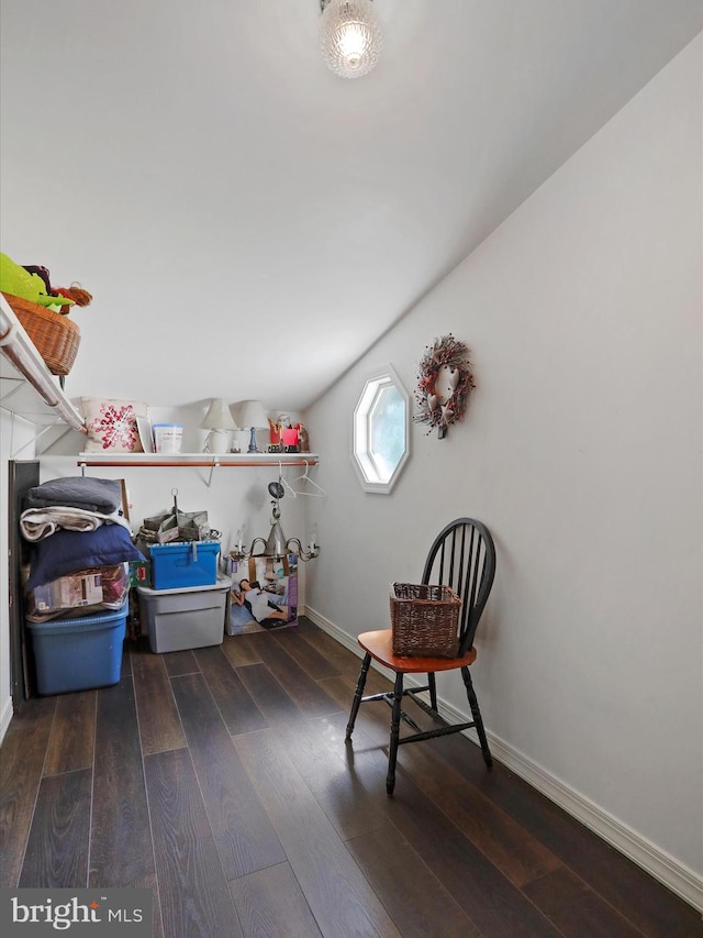 sitting room with dark hardwood / wood-style flooring