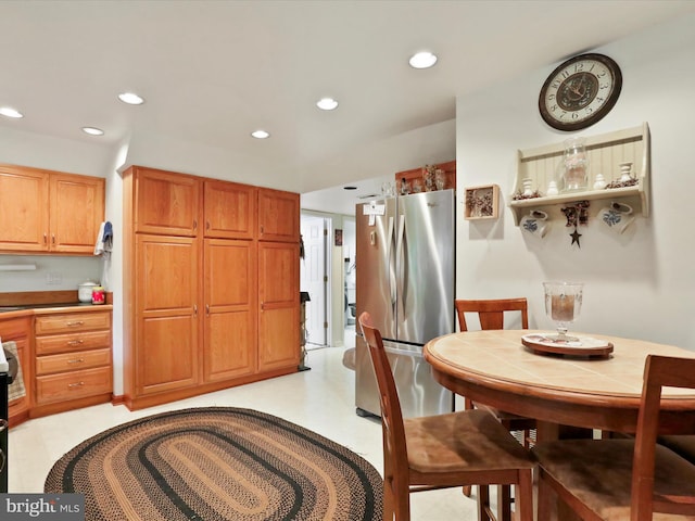 kitchen with stainless steel fridge