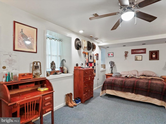 carpeted bedroom featuring ceiling fan